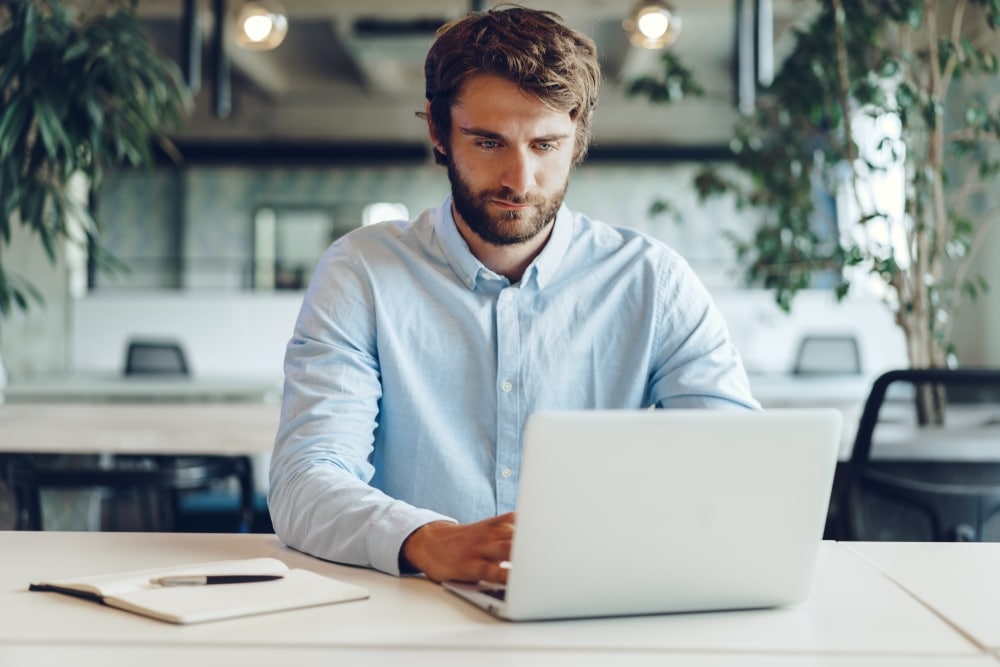 a man with a laptop