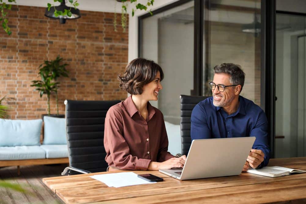 man and woman on office